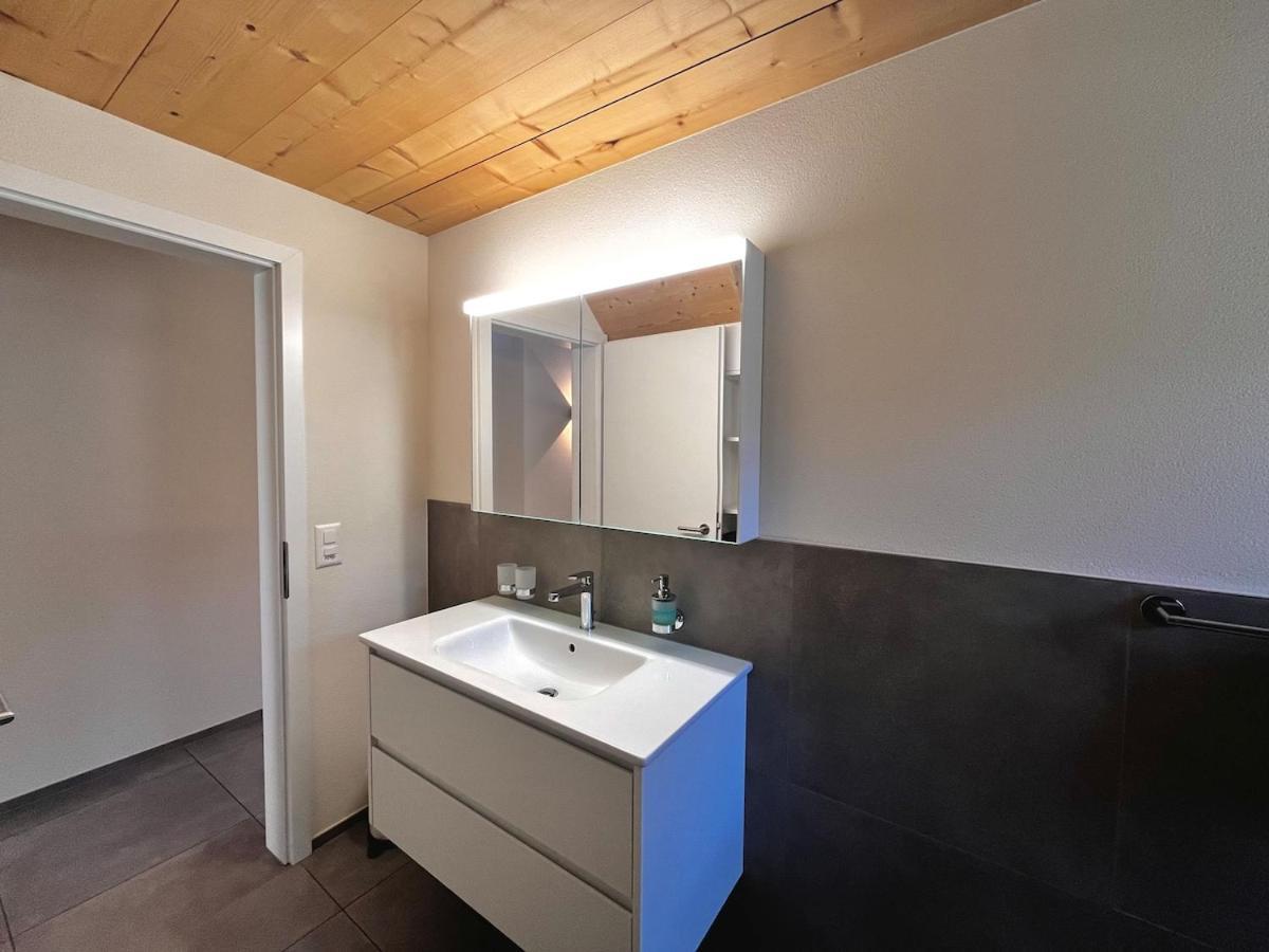 Appartement Beim Brunnen à Gsteigwiler Extérieur photo